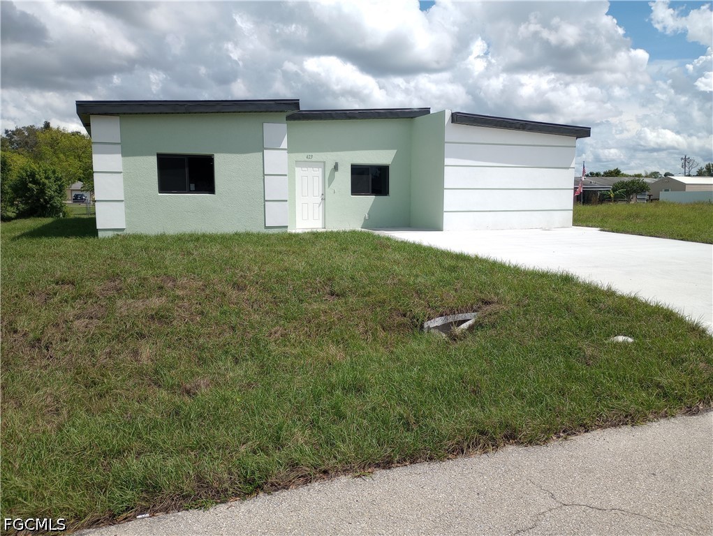 Photo 1 of 3 — 423 Canyon Drive S, Lehigh Acres, FL 33936