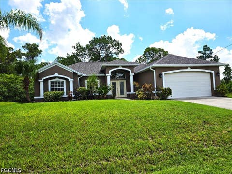 Photo of 839 Puccini Avenue S, Lehigh Acres, FL 33974 (MLS # 2026035146)