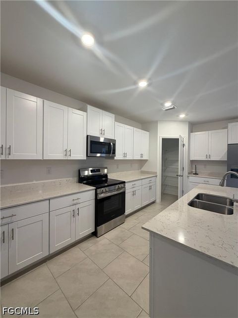 Photo of 17404 Monte Isola Way, North Fort Myers, FL 33917 (MLS # 2026020148)