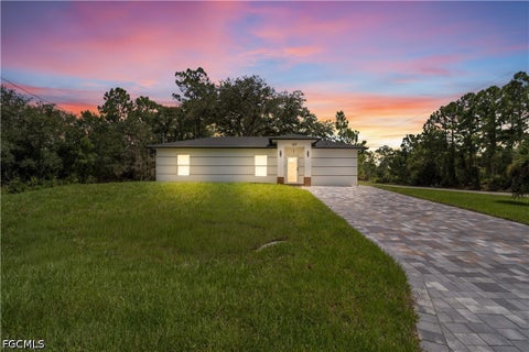Photo of 227 Narcissus Avenue S, Lehigh Acres, FL 33974 (MLS # 2026037799)