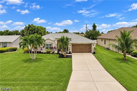 Photo of 1412 SW 43rd Terrace, Cape Coral, FL 33914 (MLS # 2026042647)