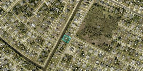 Photo of 2606 Martin Avenue S, Lehigh Acres, FL 33973 (MLS # 2026020050)