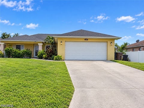 Photo of 2702 37th Street SW, Lehigh Acres, FL 33976 (MLS # 2026040606)