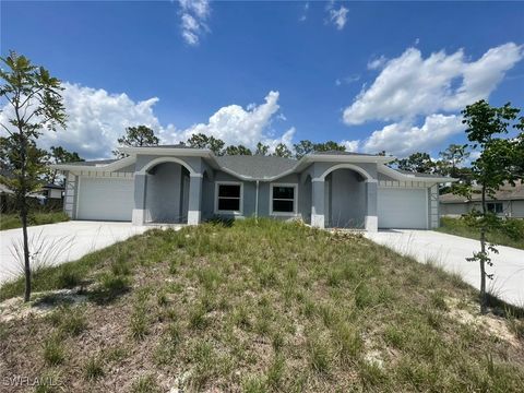701/703 IVAN Avenue S Lehigh Acres FL 33973