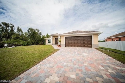 Photo of 1715 Desoto Avenue, Lehigh Acres, FL 33972 (MLS # 2026043077)