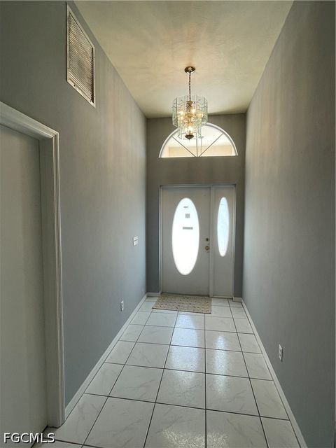 Tiny photo for 1409 SW 10th Street, Cape Coral, FL 33991 (MLS # 2026020035)