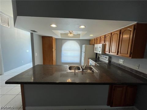 Tiny photo for 1409 SW 10th Street, Cape Coral, FL 33991 (MLS # 2026020035)