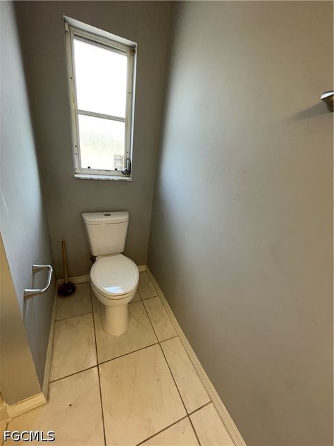 Tiny photo for 1409 SW 10th Street, Cape Coral, FL 33991 (MLS # 2026020035)