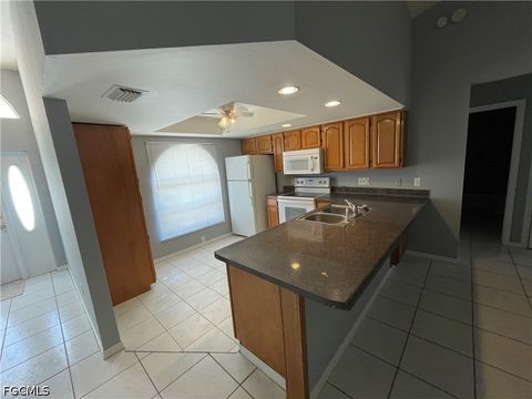 Tiny photo for 1409 SW 10th Street, Cape Coral, FL 33991 (MLS # 2026020035)