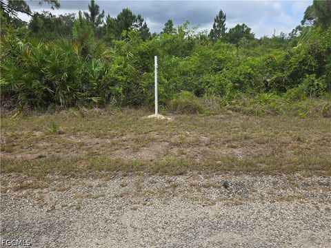 Photo of 1036 Card Street E, Lehigh Acres, FL 33974 (MLS # 2026019257)