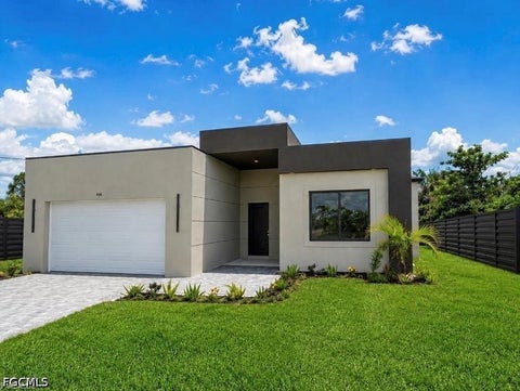 Photo of 448 Rajah Street, Lehigh Acres, FL 33974 (MLS # 2026038950)