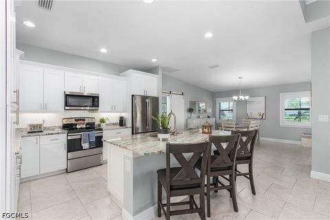 Tiny photo for 1702 SE 1st Terrace, Cape Coral, FL 33990 (MLS # 2026019471)
