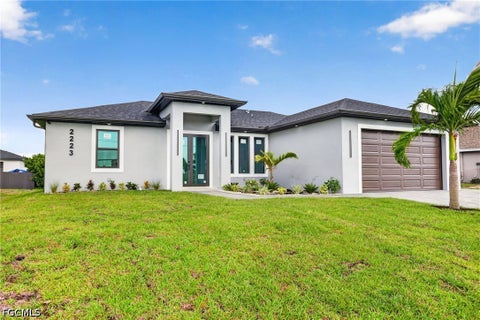Photo of 2223 NW 11th Court, Cape Coral, FL 33993 (MLS # 2026039563)