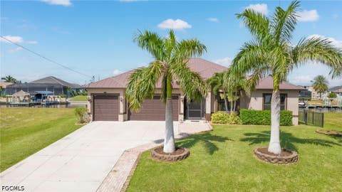 Photo of 2218 NW 37th Place, Cape Coral, FL 33993 (MLS # 2026034851)