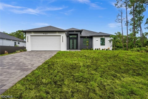 Photo of 923 Bolivia Drive, Lehigh Acres, FL 33974 (MLS # 2026037245)