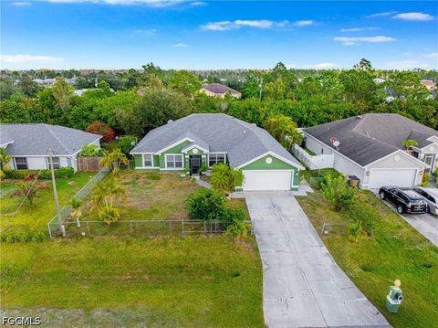 Photo of 418 Windermere Drive, Lehigh Acres, FL 33972 (MLS # 2026020093)