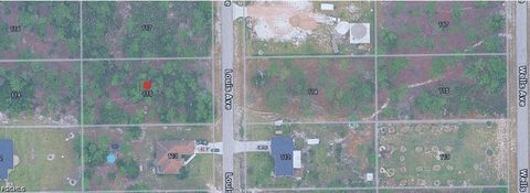 Photo of 115 Louis Avenue, Lehigh Acres, FL 33936 (MLS # 2026020245)