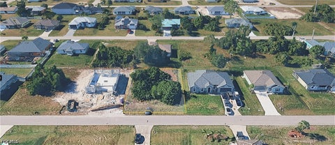 Tiny photo for 2624 NE 5th Avenue, Cape Coral, FL 33909 (MLS # 2026038935)
