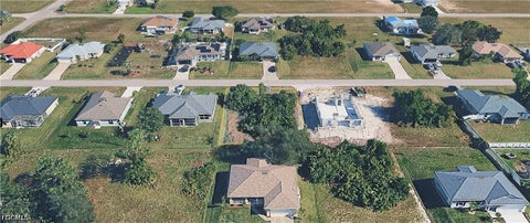 Tiny photo for 2624 NE 5th Avenue, Cape Coral, FL 33909 (MLS # 2026038935)