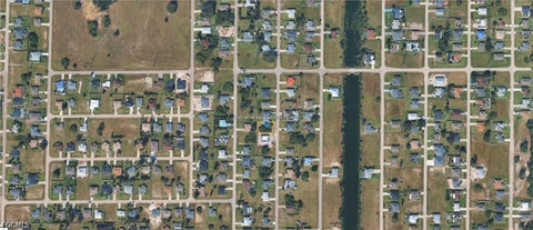 Tiny photo for 2624 NE 5th Avenue, Cape Coral, FL 33909 (MLS # 2026038935)