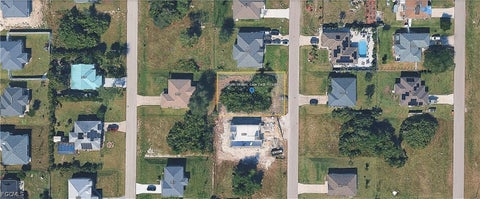 Photo of 2624 NE 5th Avenue, Cape Coral, FL 33909 (MLS # 2026038935)