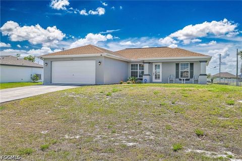 Photo of 3230 NW 3rd Place, Cape Coral, FL 33993 (MLS # 2026018622)