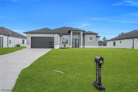 Photo of 3619 5th Street SW, Lehigh Acres, FL 33976 (MLS # 2026042288)