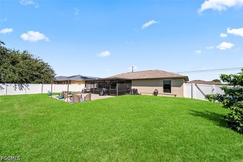 Tiny photo for 522 NE Van Loon Lane, Cape Coral, FL 33909 (MLS # 2026039081)