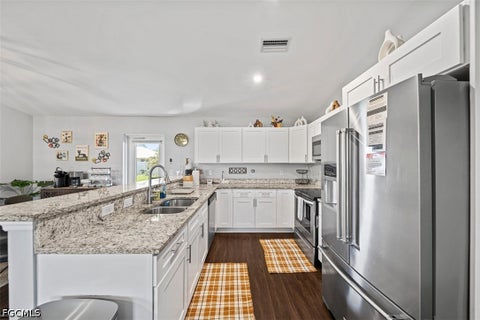 Tiny photo for 522 NE Van Loon Lane, Cape Coral, FL 33909 (MLS # 2026039081)
