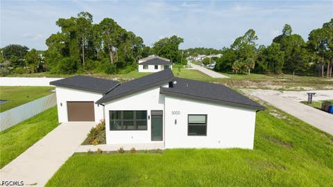 Photo of 3000 Tena Avenue S, Lehigh Acres, FL 33976 (MLS # 2026031511)
