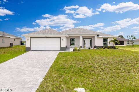Photo of 2802 NW 3rd Place, Cape Coral, FL 33993 (MLS # 2026029905)