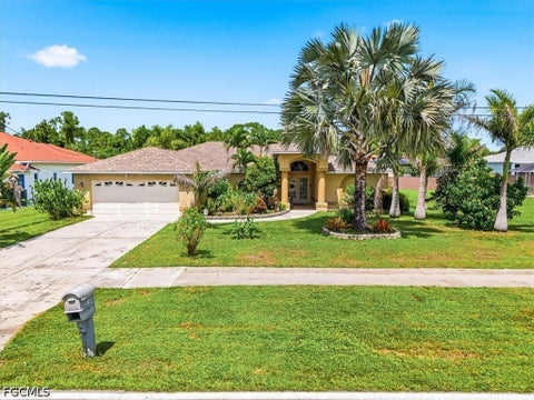 Photo of 713 Milwaukee Boulevard, Lehigh Acres, FL 33974 (MLS # 2026038410)