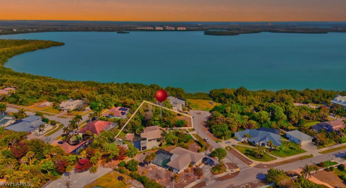 Aerial view of residential area featuring a large