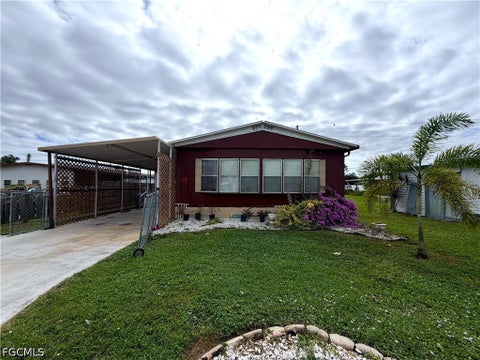 Photo of 106 Gaslight Avenue, North Fort Myers, FL 33917 (MLS # 2026025708)