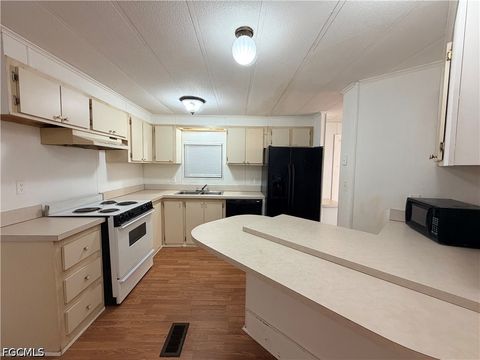 Tiny photo for 106 Gaslight Avenue, North Fort Myers, FL 33917 (MLS # 2026025708)
