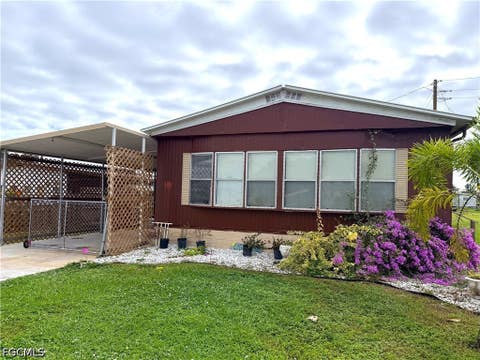 Tiny photo for 106 Gaslight Avenue, North Fort Myers, FL 33917 (MLS # 2026025708)