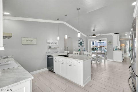 Tiny photo for 809 SW 2nd Avenue, Cape Coral, FL 33991 (MLS # 2026036725)