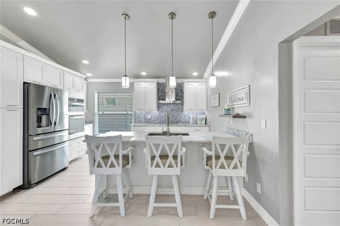 Tiny photo for 809 SW 2nd Avenue, Cape Coral, FL 33991 (MLS # 2026036725)
