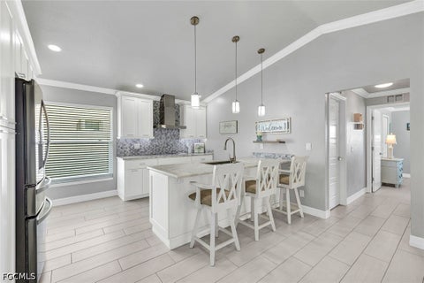 Tiny photo for 809 SW 2nd Avenue, Cape Coral, FL 33991 (MLS # 2026036725)