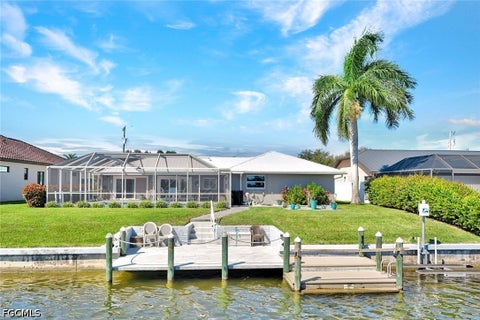 Tiny photo for 809 SW 2nd Avenue, Cape Coral, FL 33991 (MLS # 2026036725)