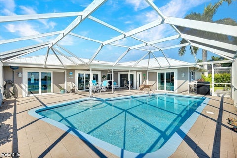 Tiny photo for 809 SW 2nd Avenue, Cape Coral, FL 33991 (MLS # 2026036725)