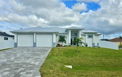 Photo of 141 SW 35th Place, Cape Coral, FL 33991 (MLS # 2026034919)