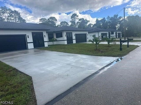 Tiny photo for 2249-2251 Fairway Drive, Lehigh Acres, FL 33973 (MLS # 2026039796)