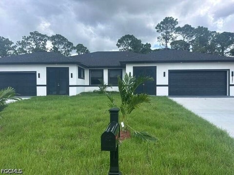 Photo of 2249-2251 Fairway Drive, Lehigh Acres, FL 33973 (MLS # 2026039796)