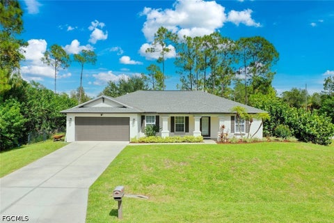 Photo of 137 Napier Avenue S, Lehigh Acres, FL 33974 (MLS # 2026037314)