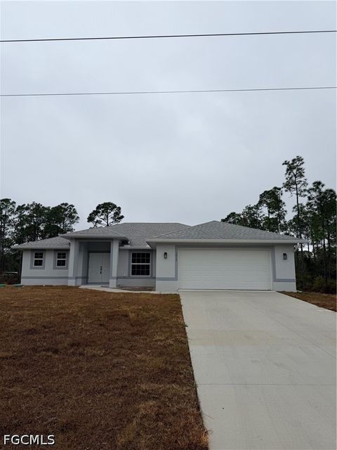 Photo of 1017 Maple Avenue N, Lehigh Acres, FL 33972 (MLS # 2026015224)