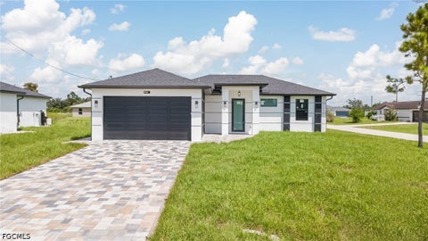 Photo of 2700 11Th St SW ST, Lehigh Acres, FL 33976 (MLS # 2026037387)