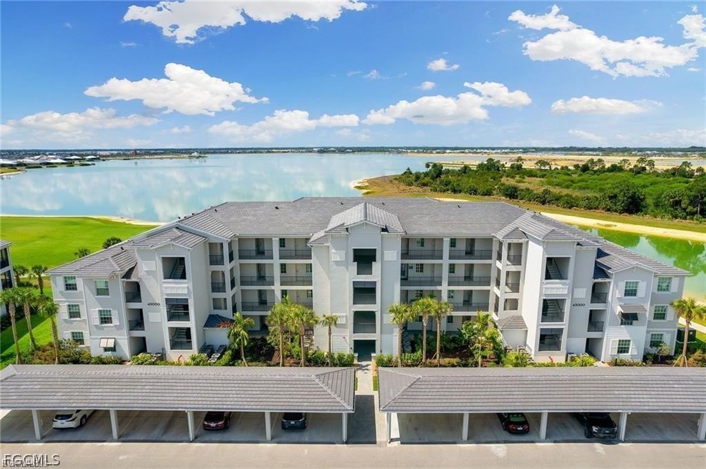 View of apartment building / complex featuring a w