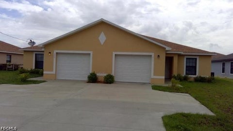 Photo of 411 Nicholas Parkway W, Cape Coral, FL 33991 (MLS # 2026039360)