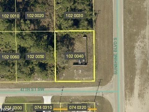 Photo of 3102 47th Street SW, Lehigh Acres, FL 33976 (MLS # 2026018759)